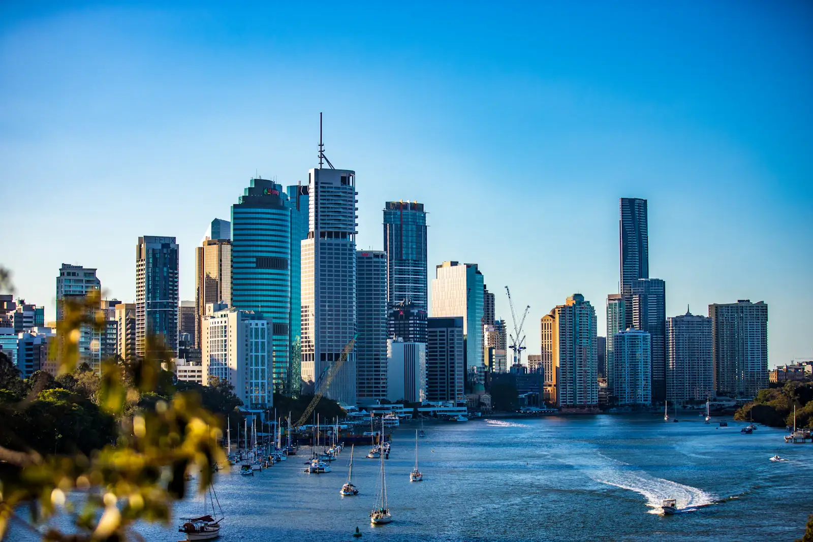 The Brisbane city skyline on a clear day, seen across the river